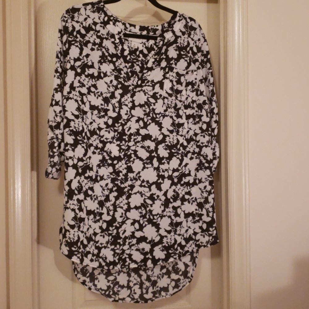 White and black blouse.